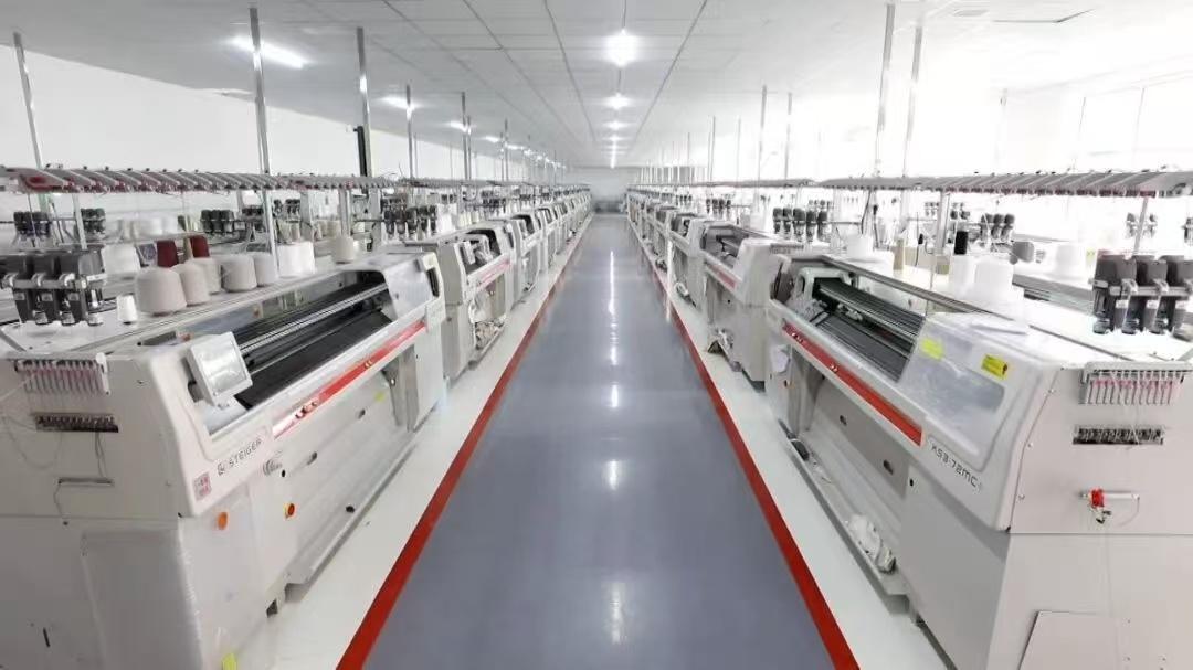 Customer-provided photograph of the knitting production workshop